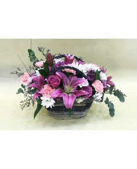 Flowers In Wooden Basket